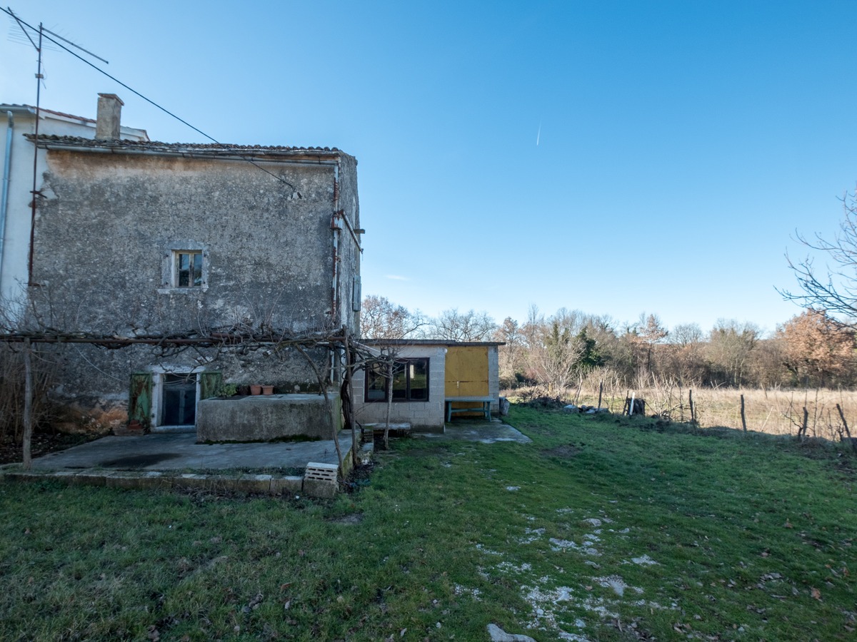 Stone houses on a spacious property ready for renovation in the